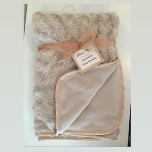 Fleece rose reversible baby blanket in tan